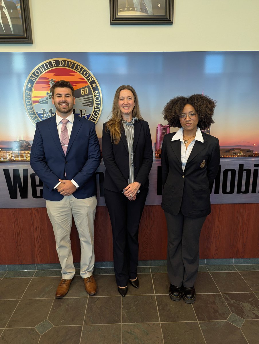 FBI Mobile SAC Sara Jones administers the oath to two of our new interns that will be working alongside the men and women of the FBI.