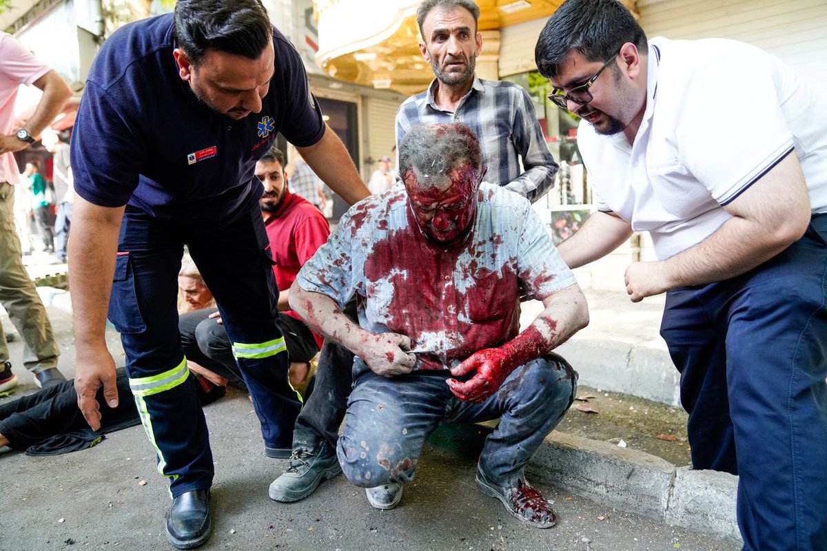 A wounded man following #israeli strikes on #Tehran... The UNPROVOKED attacks by #israel on #Iran have killed and injured hundreds of civilians.