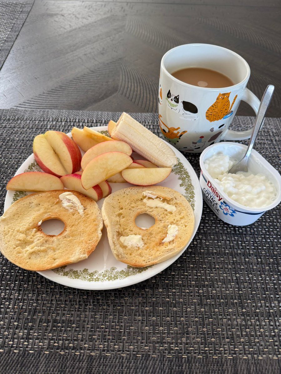 Sippin coffee munchin’ joy ☕️🍓🥯