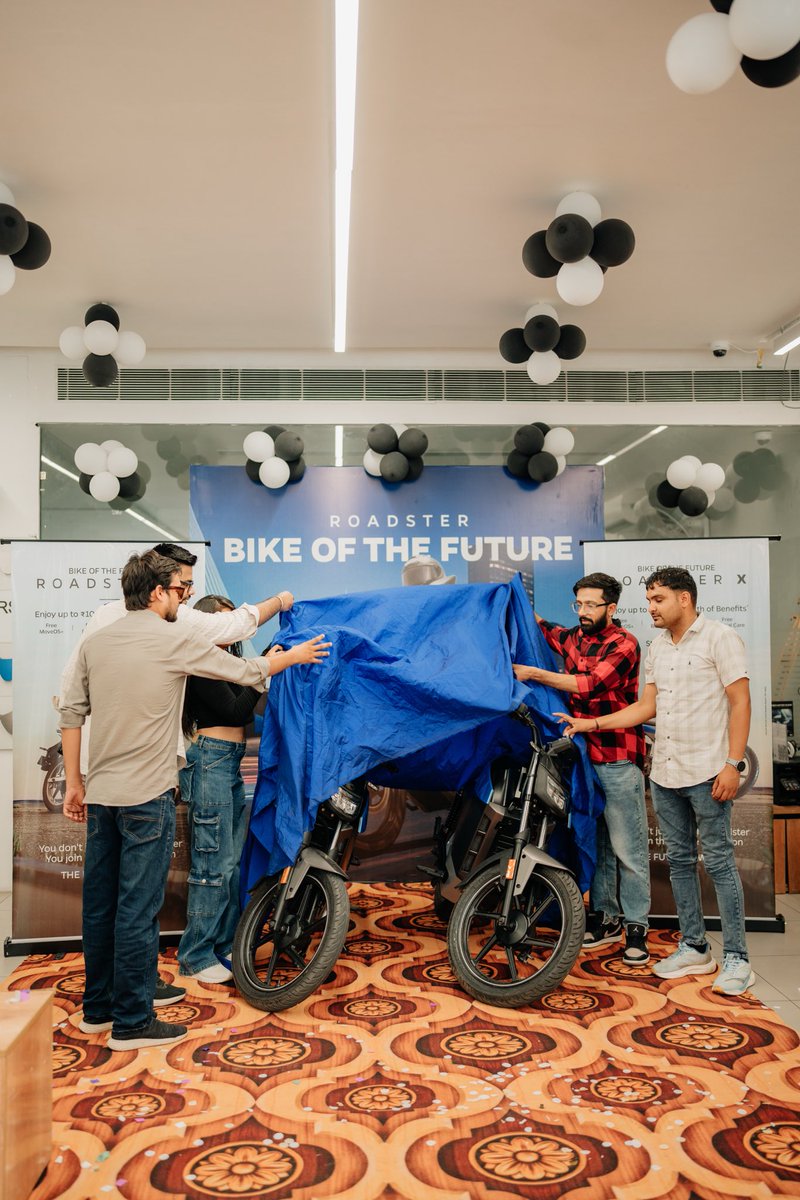 OlaElectric's tweet photo. The Roadster has officially arrived in Jaipur. 
Here’s a glimpse of what went down on delivery day.
Now it’s your turn to test ride the bike of the future. Book now.
#RoadsterX #BikeOfTheFuture #RideTheFuture https://t.co/k7zFA8v6wd