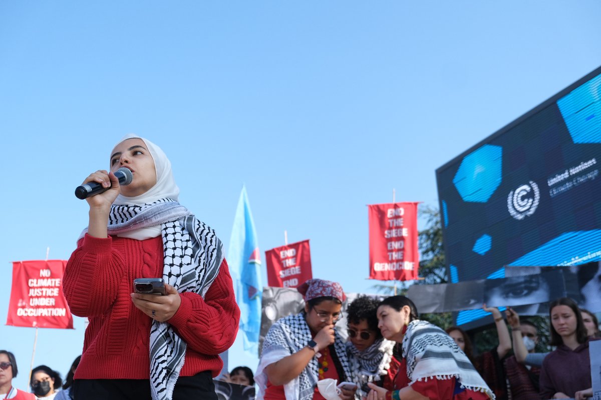 PriceofOil's tweet photo. Local movements, Palestinian activists, and international social and climate justice groups gathered today at the United Nations #JuneClimateTalks to express deep outrage about Israelโs brutal campaign of bombing, massacres, and starvation against Palestinians. https://t.co/o8OJ0CNFM8