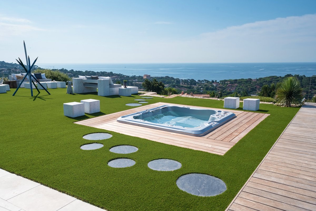 We love how this in-ground hot tub adds to the landscaped lawn, creating a peaceful environment with a stunning view 😍​

Feeling inspired? Start your journey to becoming a hot tub owner today: hubs.li/Q03mCjq60​

#wateriscalling #hydropool #hottub