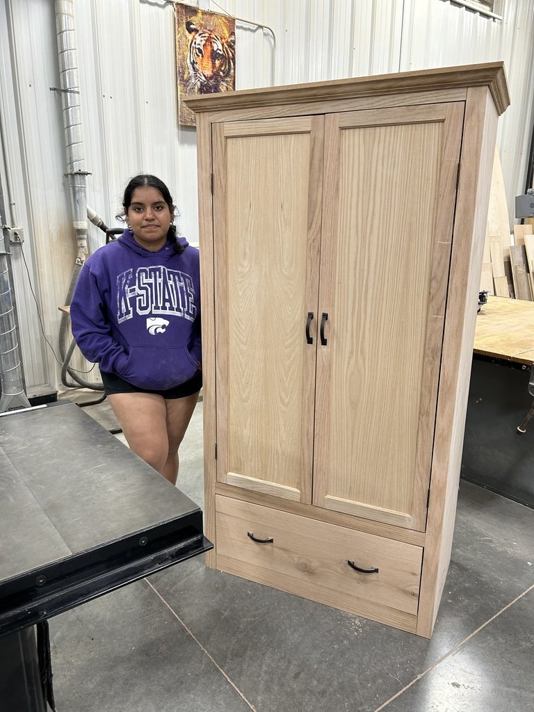 Allison built this beautiful cabinet out of oak.  It just needs some stain and finish now.  Good job, Allison!