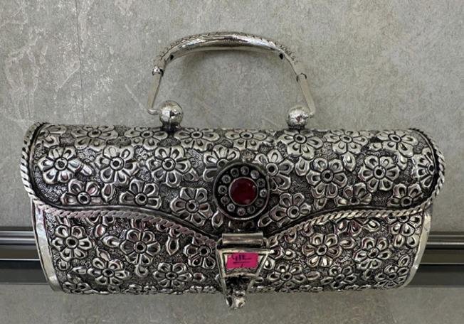 Prime Minister Narendra Modi gifted a made in Andhra Pradesh Silver Clutch Purse to the First Lady of Cyprus, Philippa Karsera.