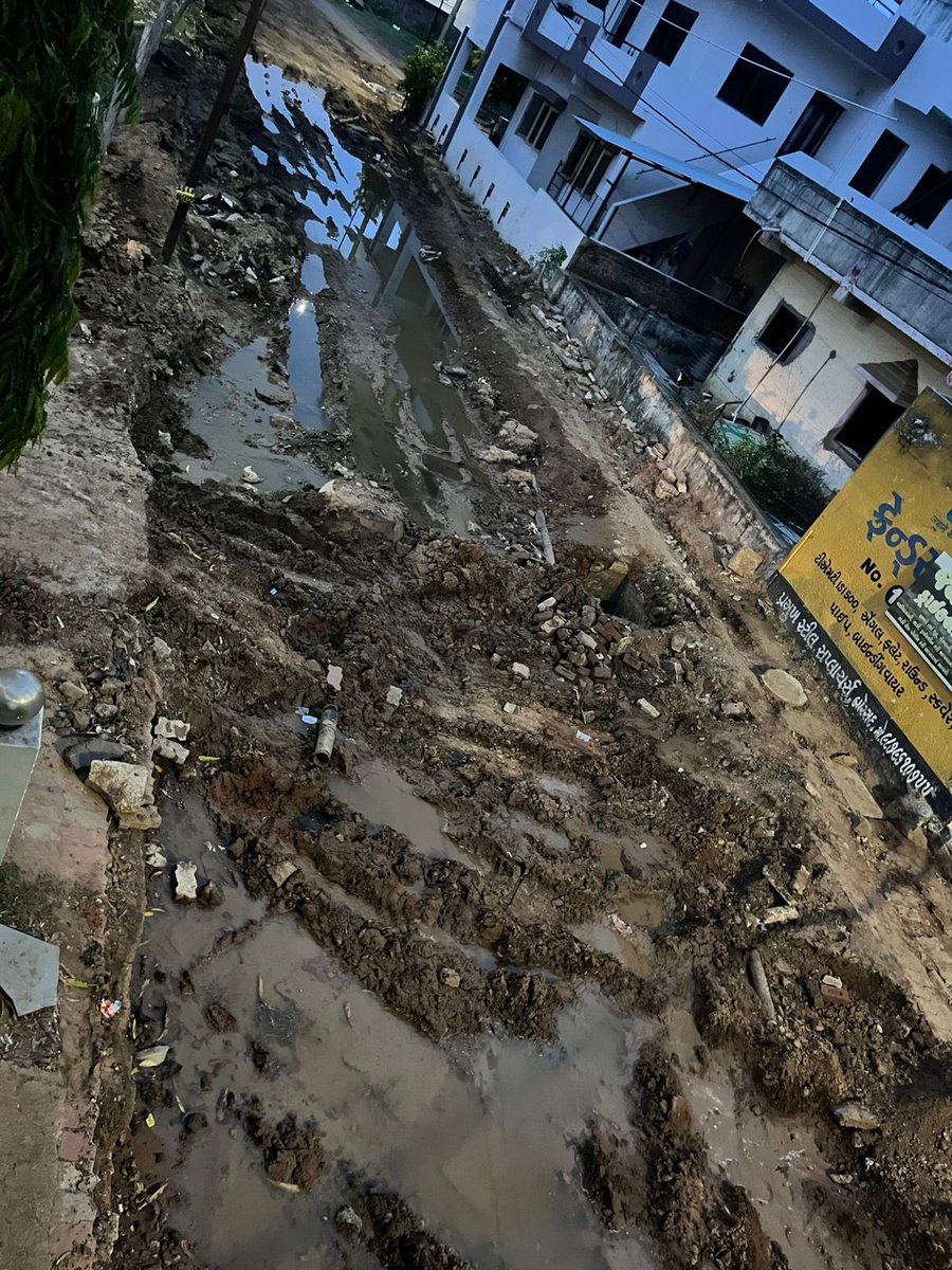 Nisarg_1107's tweet photo. Enough is enough! The main road near Nandanvan Society, #Borsad, has been a disaster for WEEKS after gutter work. Now, thanks to the rain, it’s just mud, potholes, and chaos. School kids, ambulances, everyone is stuck. @CollectorAnd @GujaratPolice @sanghaviharsh https://t.co/n5L0QFxeMt