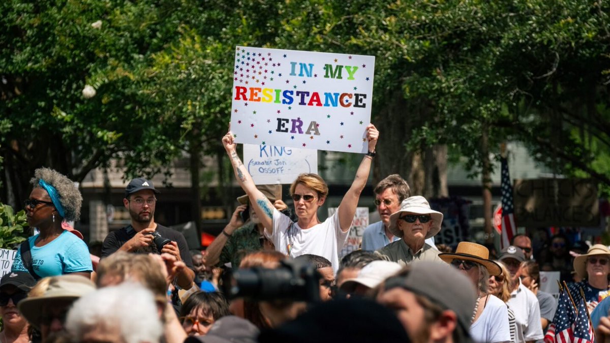 Thousands of demonstrators marched in cities throughout Coastal Georgia Saturday in protest of the Trump administration’s policies. The “No Kings” gatherings nationwide were part of a mass mobilization effort timed for the same day as a military parade planned for Washington,
