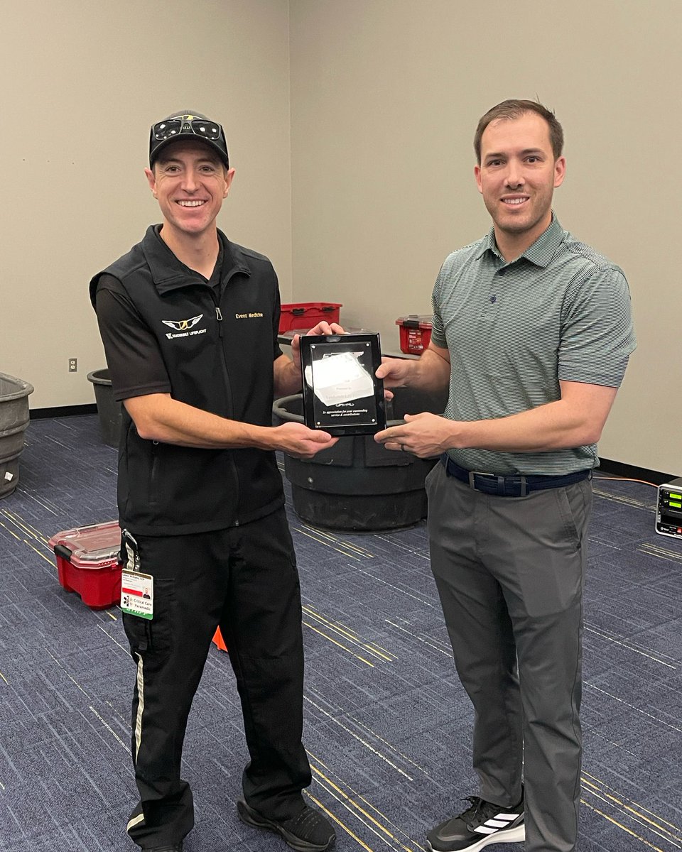 Justin Tatman, LAT, ATC presented Casey Williams of Vanderbilt Life Flight with this year's TATS Corporate Partner Award during the Vanderbilt Youth Sports Health &amp; Safety Conference