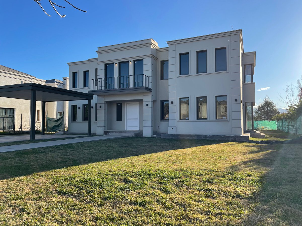 kernelshock's tweet photo. House for sale accepting Monero (XMR)

I'm selling a house in a gated community in Mendoza, Argentina. It's almost finished, probably about 3 months away from completion. Located in a really beautiful private neighbourhood called La Vacherie Country Golf. It's about 20 minutes from downtown Mendoza and has a ton of nature, open space, and great views of the mountains.

The neighbourhood has 24/7 security, two golf courses (one regular 9 hole and one par 3), a clubhouse with a restaurant, 2 tennis courts, gym, swimming pool, and a bunch of lagoons scattered around. It also has all the basic services trash pickup, water, etc.

Price 680.000$ usd or equivalent in XMR.
Lot size 1150 m²
Home size 530 m²
4 bedrooms + 1 service room.
6 bathrooms.
Pool, garden, and a gallery with a built-in grill
Covered garage for two cars.
Wine cellar in the basement.
Really nice finishes: travertine floors, radiant floor heating, double glazed aluminum windows, high end kitchen and bathroom fittings.

Layout:

Basement:
Wine cellar

Ground floor:
Entrance hall
Main living room
Dining room
Independent kitchen with breakfast bar
Guest bathroom
Flexible room (could be a study, TV room, or playroom)
Laundry area 
Service room with its own bathroom

Upper floor:
Master suite with walk-in closet and full bathroom
3 more bedrooms, all with en-suite bathrooms
Another flexible room for office/study/playroom

The backyard opens straight out to the golf course, so the view is amazing
Happy to share more info or photos.  Payment in Monero (XMR) or other cryptos.
Xmrbazaar post coming soon!

The grass looks a bit yellow, it's just because it's winter here right now. The rest of the year, everything is super green and lush.