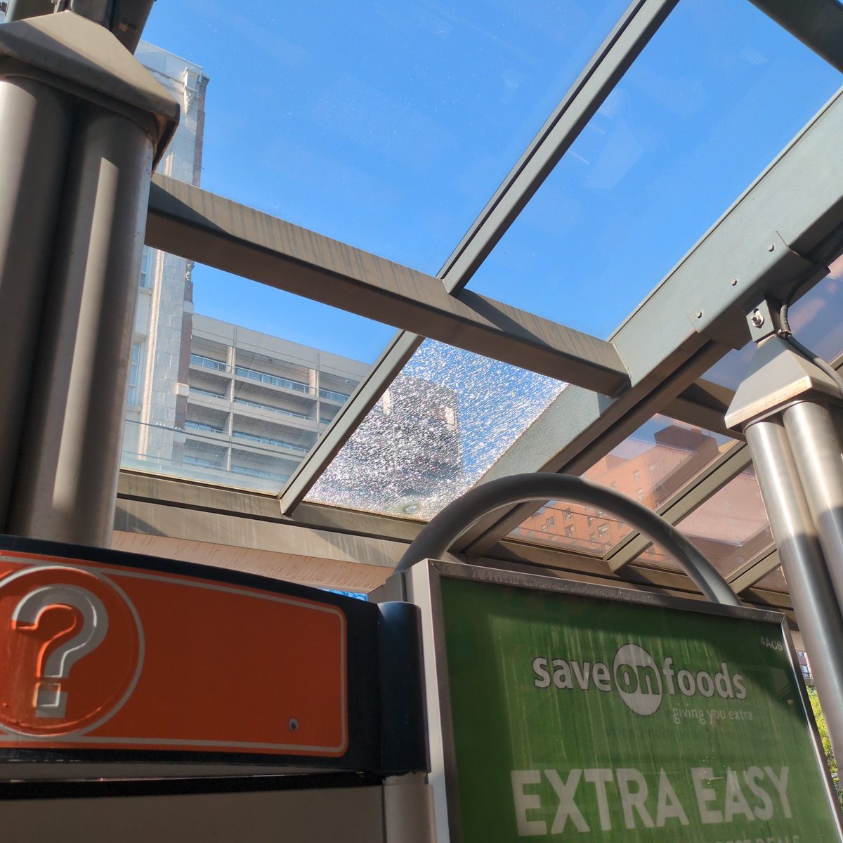 RossettiDale's tweet photo. @calgarytransit Please be advised that one of the glass panes for the roof at Centre Street station is quite fractured. https://t.co/dezpuAdWV6