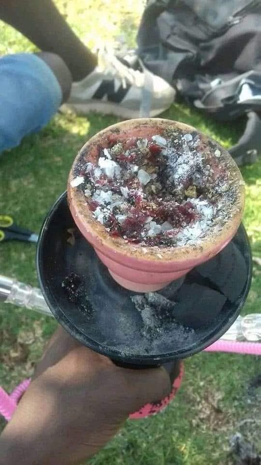 Am_Blujay's tweet photo. Crystal meth is being mixed with hookah (hubly) flavors, making it extremely dangerous. This mixture can cause memory loss, unconsciousness, and insanity, leading to severe consequences, especially for women. Victims may be trafficked, forced into non-consensual sex acts, prostitution, or pornography without their awareness. Some wake up in unknown places, unaware of what happened, such as having been assaulted or exploited. The drug is highly toxic and can lead to blackmail or abuse.

 Warning:Avoid smoking hookah from unknown sources, as it may contain crystal meth. Stay cautious to protect yourself from these risks.