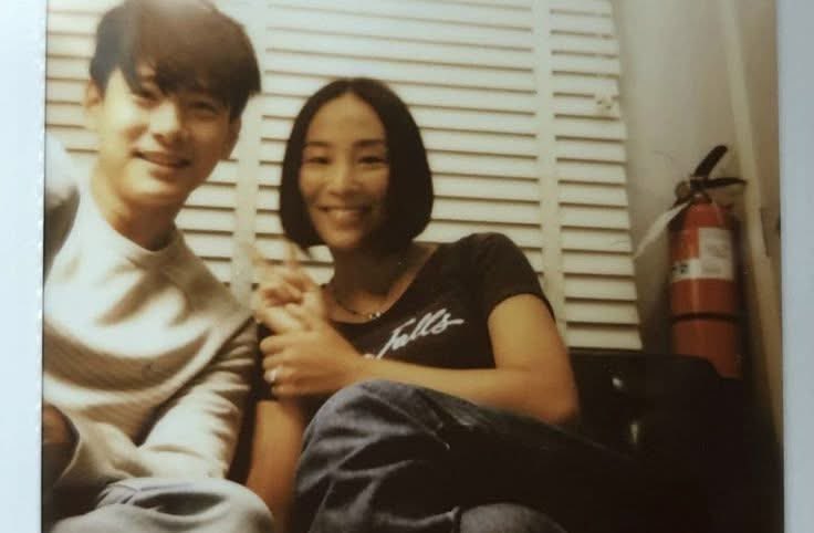 just found an old pic of my mom with her childhood friend????? they kinda look good together ngl 😭😭