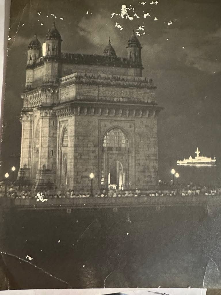 A rare night shot of the Gateway of India, Munbai taken around 1935. The illuminated ship in the background and the huge crowd suggest it could’ve been New Year’s Eve or a major naval ceremony.

Despite slight damage, the clarity is remarkable — especially given the era. The