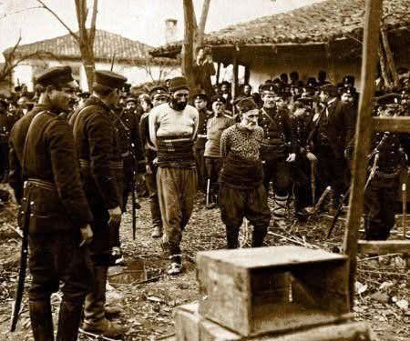 An Ottoman farmer praying before his execution by Bulgarian rebels during the Balkan Wars