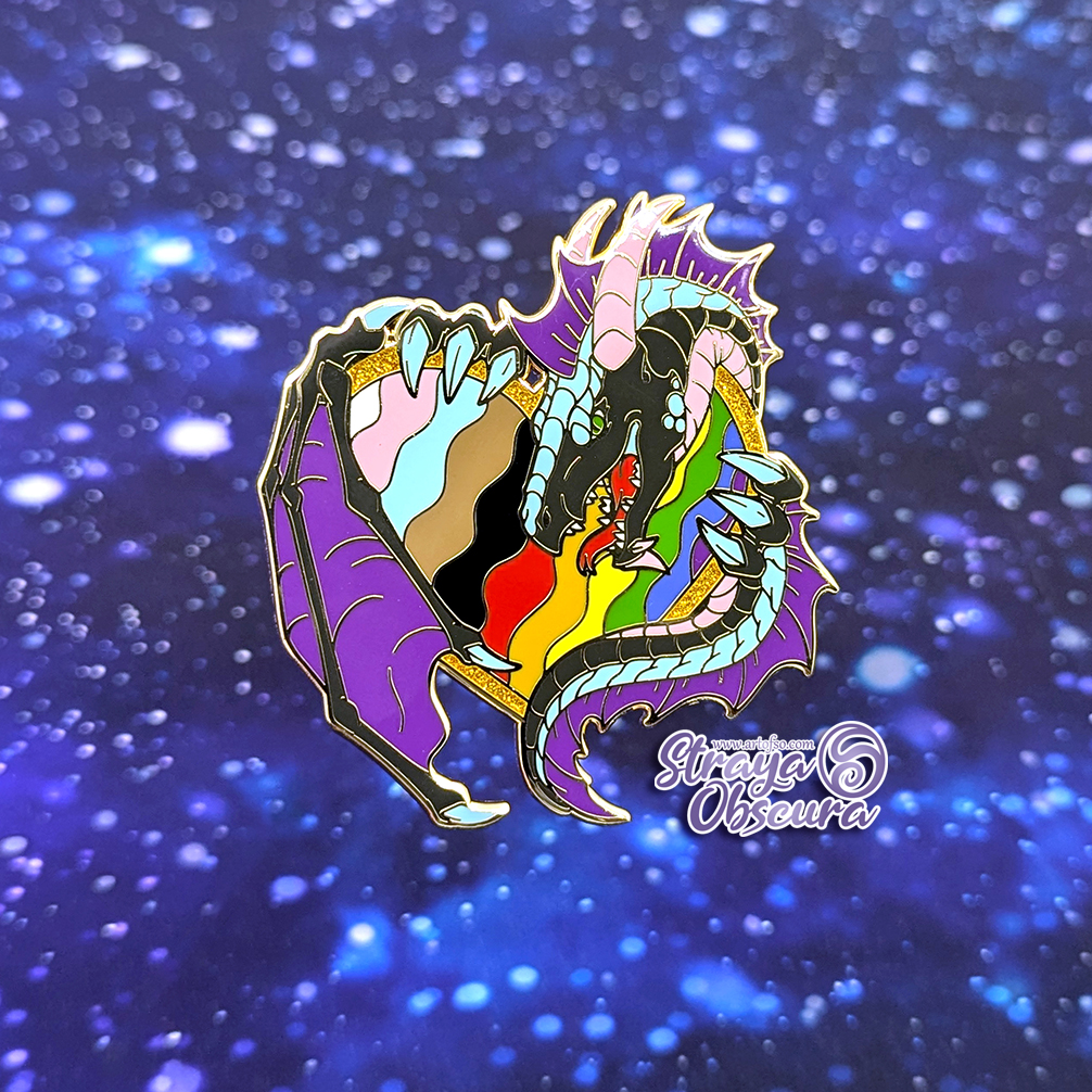 "This year more than ever we must stick together - scale to scale! Keep our shimmering hearts protected but don't let them think that's weakness!"

2025 Pride Dragon is HERE! Where to find 'em is in the bio!