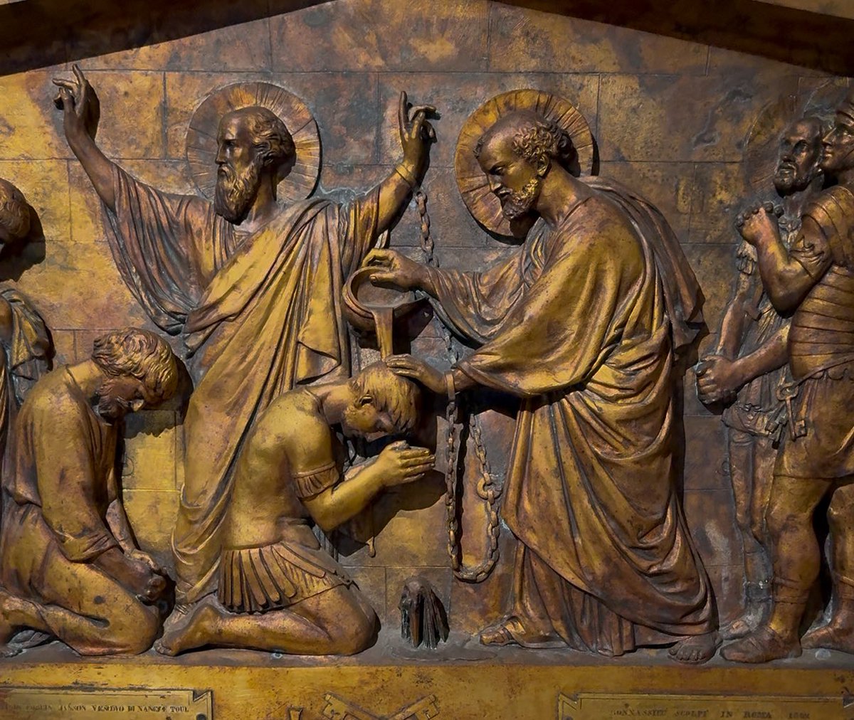 Peter and Paul baptizing prison guards while incarcerated in Mamertine Prison: