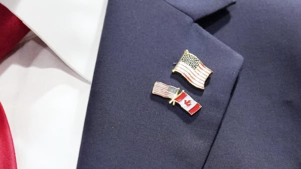 erinotoole's tweet photo. ‘The pin seen around the world’. A very positive sign. 🇨🇦 🇺🇸 https://t.co/W8poWDaWjv