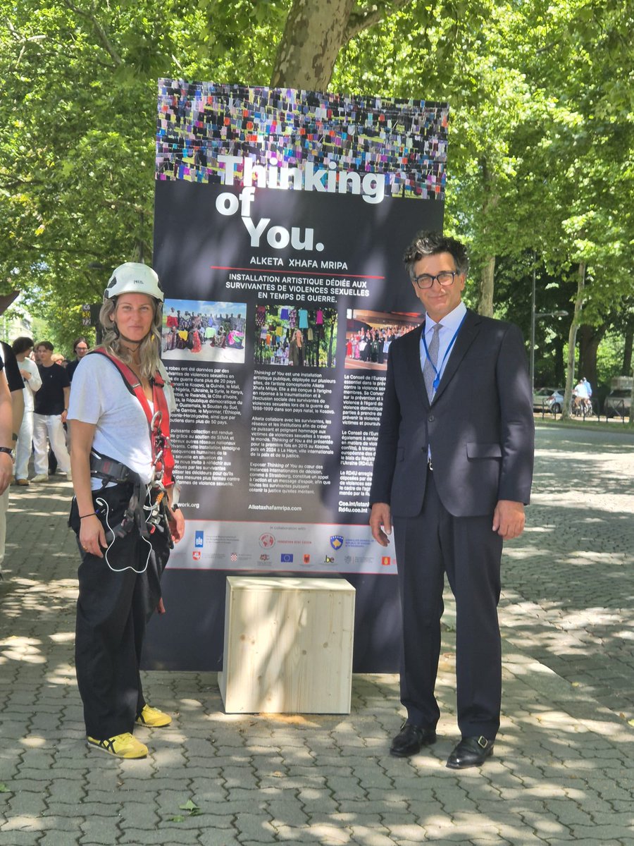 lulzimh's tweet photo. Happening now just outside @coe: Alketa Xhafa-Mripa begins hanging dresses for #ThinkingofYou — a haunting tribute to survivors of wartime sexual violence. Each dress rising to break the silence, to honor courage, &amp; to reclaim dignity of survivors. Official launch in a few days! https://t.co/d4CEQLvJOp
