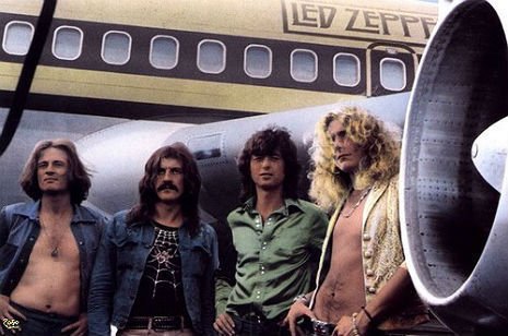 Led Zeppelin in front of their private jet, 1973