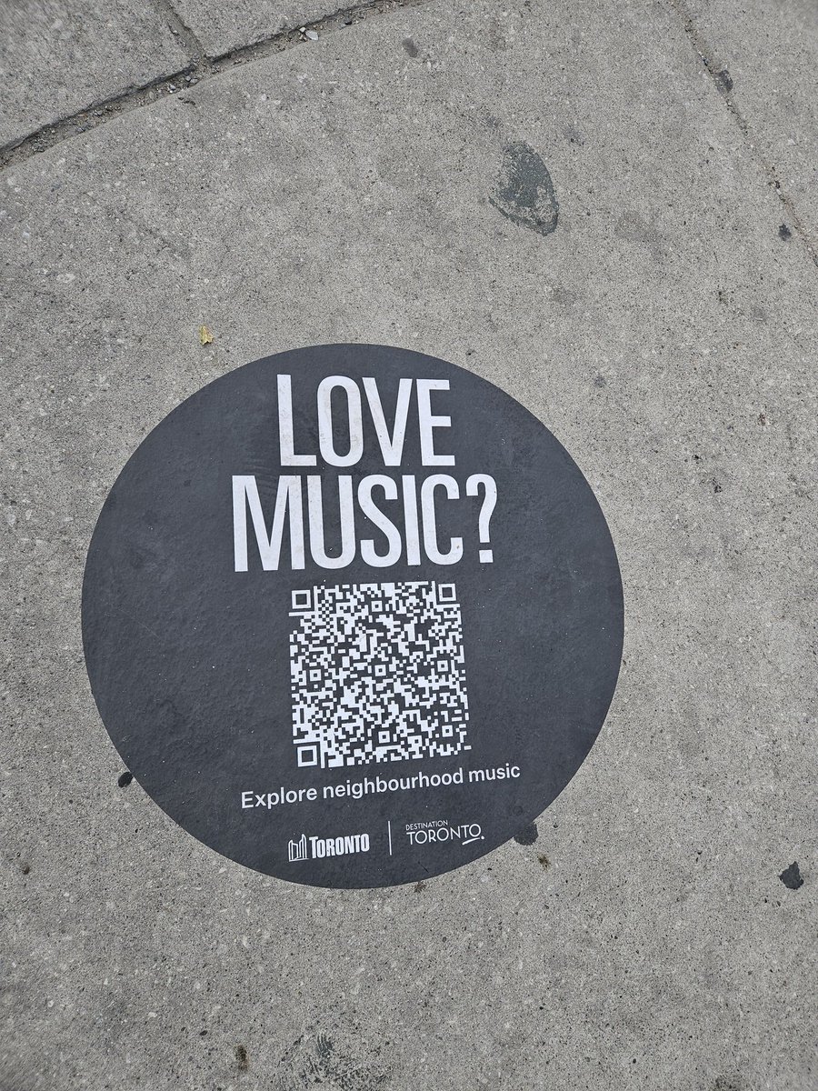 This popped up on the sidewalk in multiple locations across the Junction.  It takes you to a link showing local live music venues.