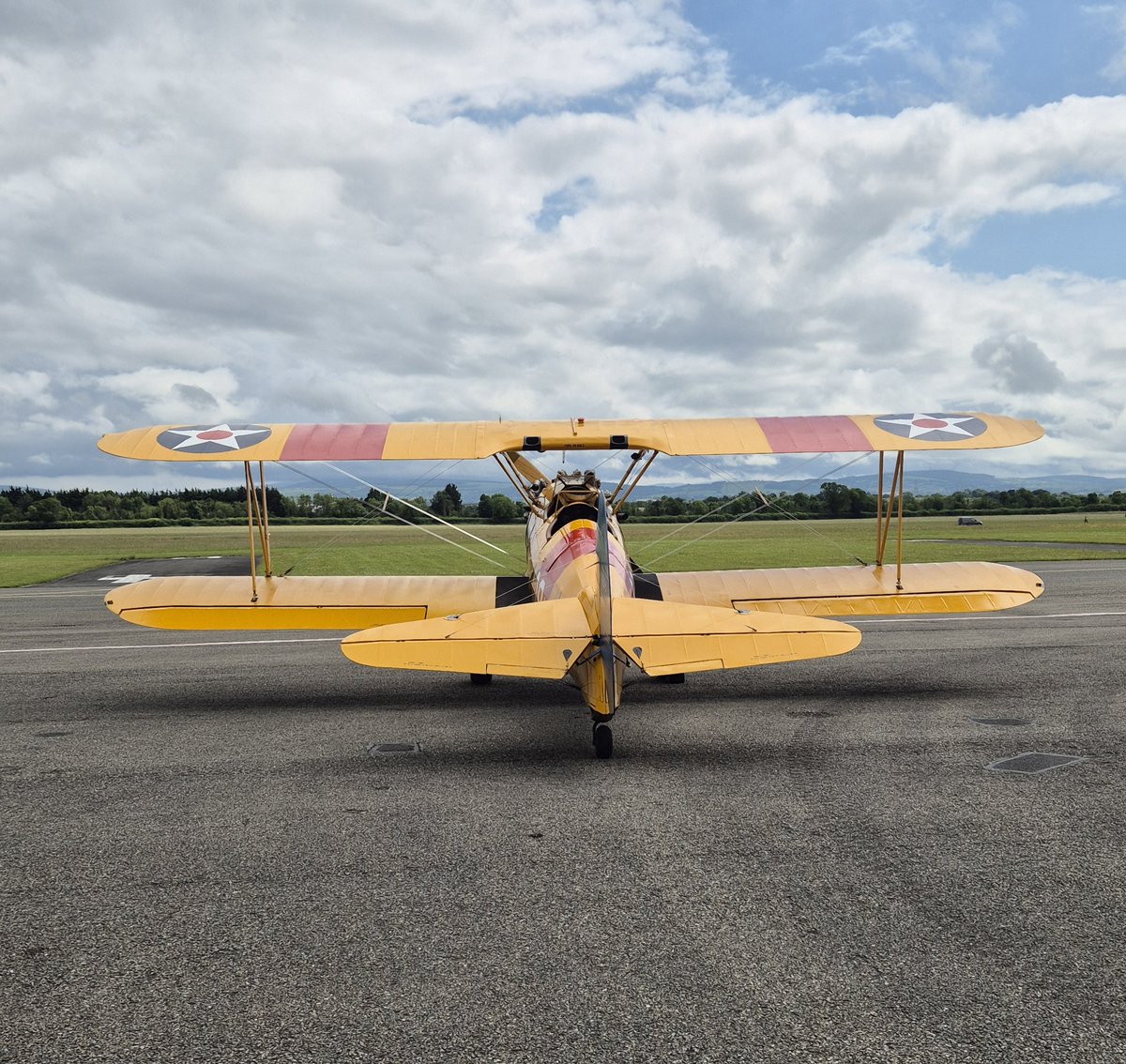 westonairport's tweet image. The majestic Boeing Stearman on the apron at Weston today. A great mix of old and new alongside the @Bristow_Group AW189, both adding some great colour on a summer's day! 🌞😎