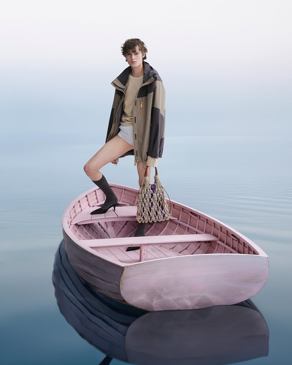 The serene silence of a summer dream. Noor poses in Prada “Days of Summer”. 
Discover more at: tinyurl.com/4dxhvcyz
 
Creative Directors: #MiucciaPrada and #RafSimons 
Photography: Oliver Hadlee Pearch
Campaign Creative Direction: Ferdinando Verderi 
Cast: Noor
 
#PradaSummer