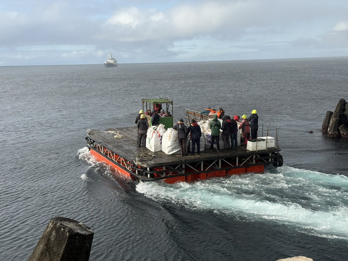 Piquer's tweet image. As we backloaded the MFV Lance today a beautiful rainbow came out over the harbour. Fair winds and following seas! #TristandaCunha #harbour #ship #ocean