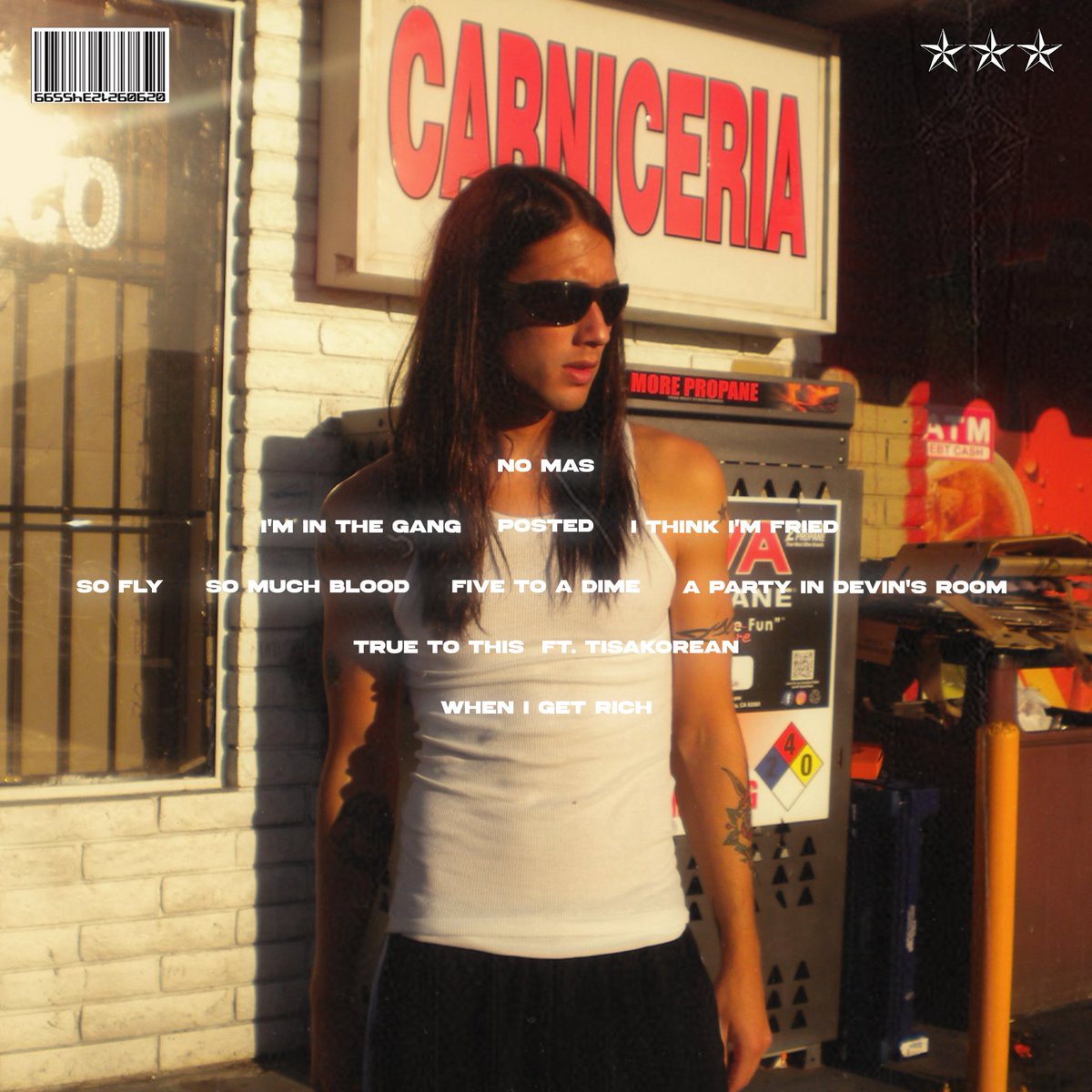 “ESI 2” back cover track list. Album drops next week 🩸