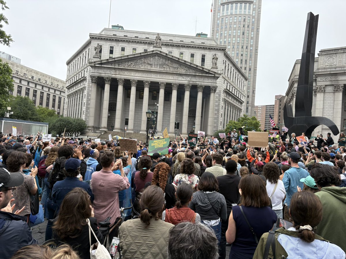 Sustained cheering outside the Manhattan courthouse after a speaker announces that Brad Lander has been released from federal custody. Followed by chants of “Free them all!”