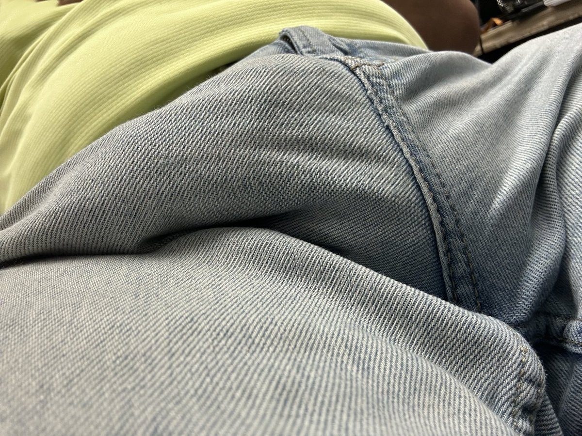 He is trying to break free from these jeans