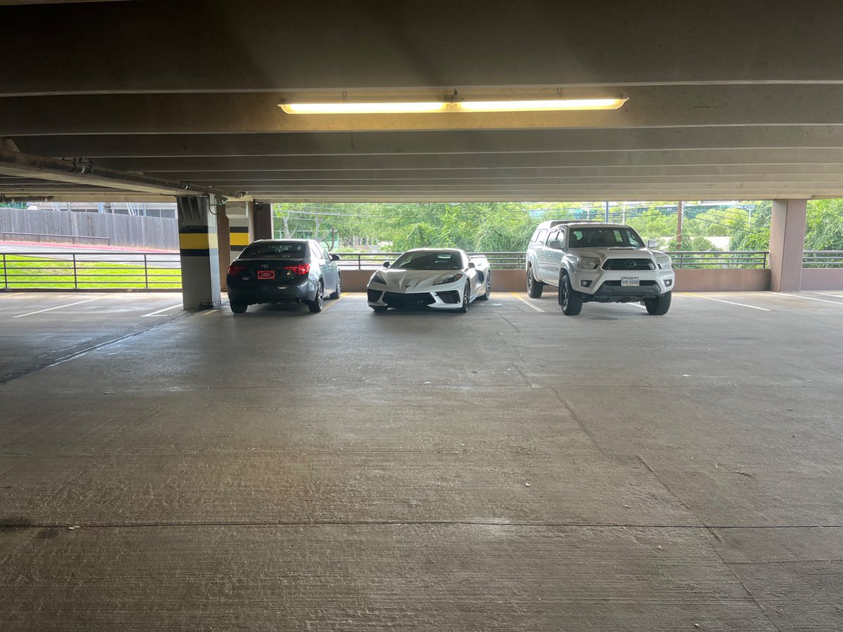 How nice does the car need to be to justify taking two spots?

(Garage is only about half full)