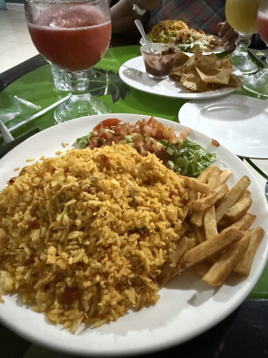 Chicken and rice with watermelon juice drink 

Ciudad Neily, Costa Rica