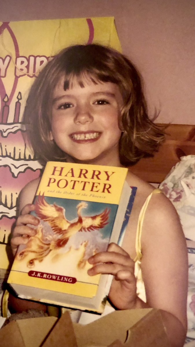 This is the little shit who runs this account 📚✨

(We do not support JKR in this house but how cute and on brand that little me was THRILLED to get a 750+ page book for her 7th birthday 🥹)