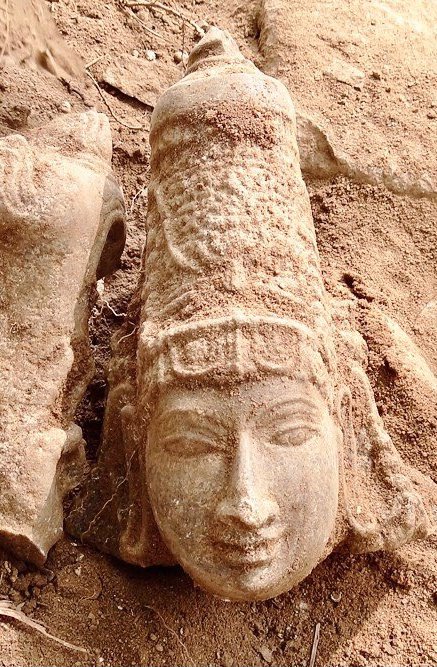 14. A stunning sculpture head unearthed archaeologist buried portion of old temple