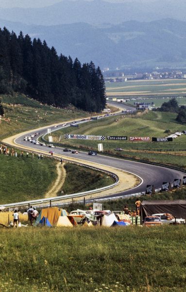 Good morning y'all 🌞 

1972 Austrian Grand Prix, Österreichring.

Fans watch as Jackie Stewart/Tyrrell 005  leads the field at the first lap.

The 54 lap race was won by Emerson Fittipaldi/Lotus 72D,second place finish for Denny Hulme/McLaren M19C and third place finish for