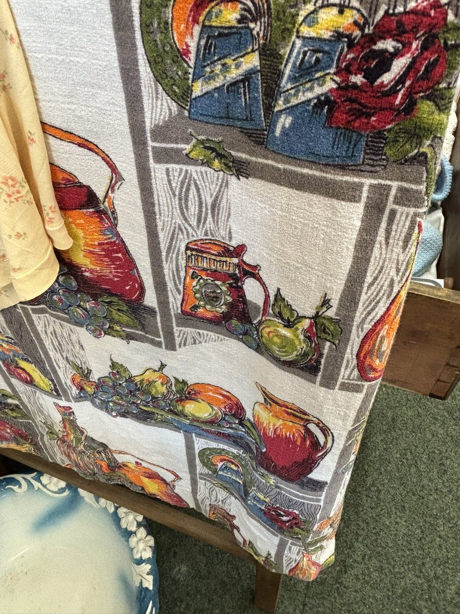 We do love our textiles. 
Curtain material screams 1950s and the Laura Ashley blouse is beautifully made. No exposed seams.