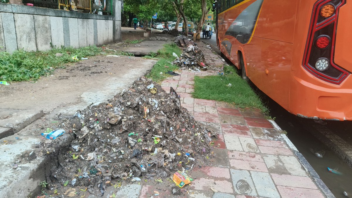 azadkumarazad's tweet photo. @DelhiCM25 @gupta_rekha @LtGovDelhi @narendramodi @PMOIndia  Desilting drains is necessary, but what’s the point if the silt is just left beside them? After yesterday’s rain, it has either washed right back into the drain or spread across the road, creating more mess. https://t.co/G7VzMJ8JJE