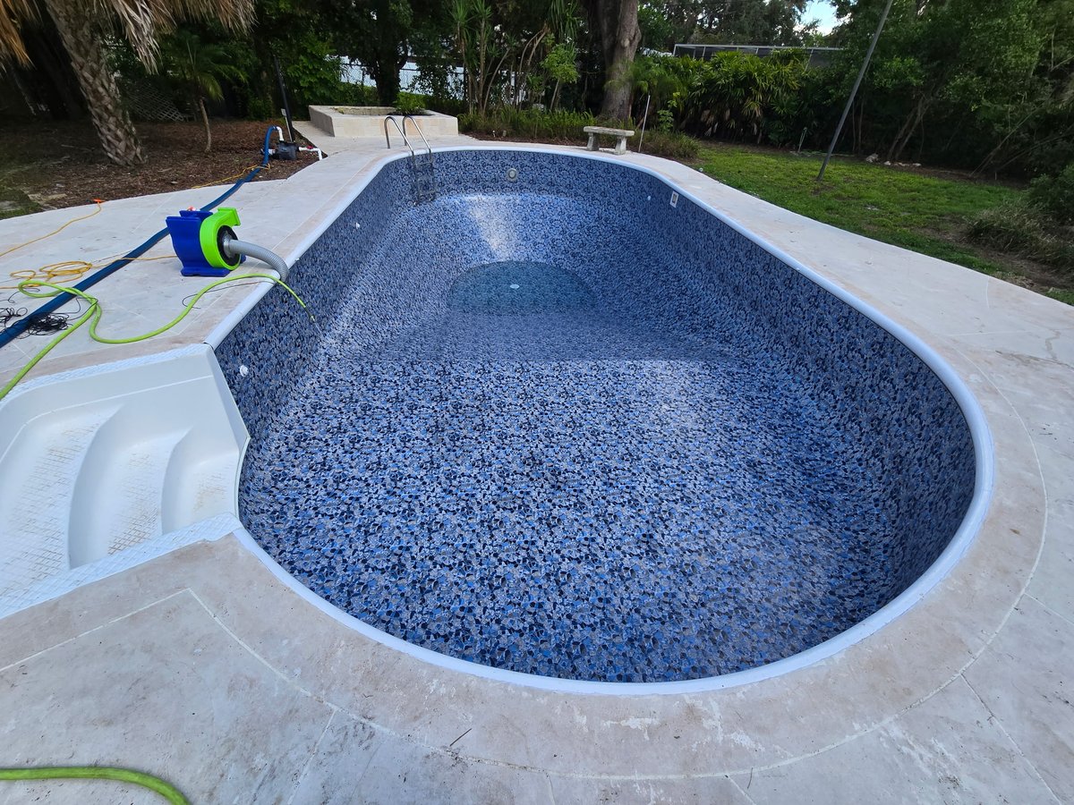ppalmpools's tweet image. The customer reached out for pool rehabilitation, we removed their old, damaged liner, prepped the pool floor and walls, and installed a new Latham Vinyl Liner in Pearlstone pattern. We also replaced all faceplates and trim. #PoolRestoration #HomeRepair