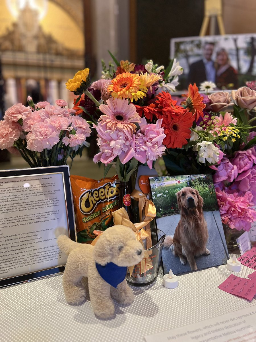 epmurphymn's tweet image. The memorial for Melissa and Mark Hortman outside the MN House Chamber, for solemn reflection.