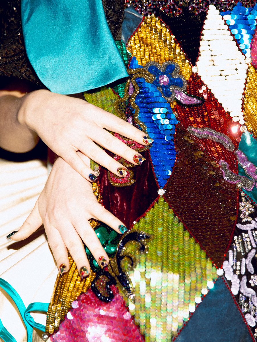 the nails matching the cape? just marvelous.