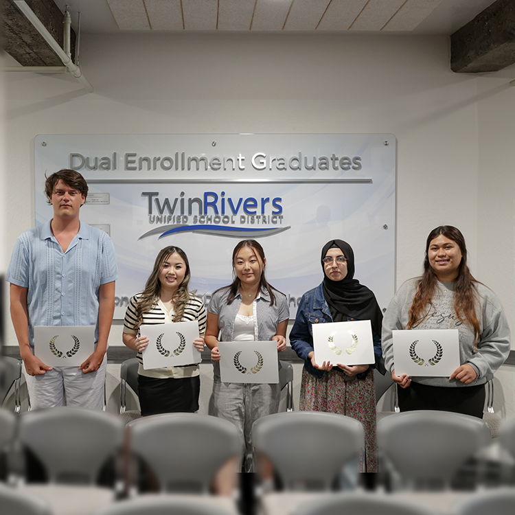 Celebrating our Dual Enrollment graduates with a wall plaque with all their names! Since 2023, nine Twin Rivers Unified students have earned their high school diplomas AND associate degrees at the same time through our partnership with American River College. #TRUSDProud