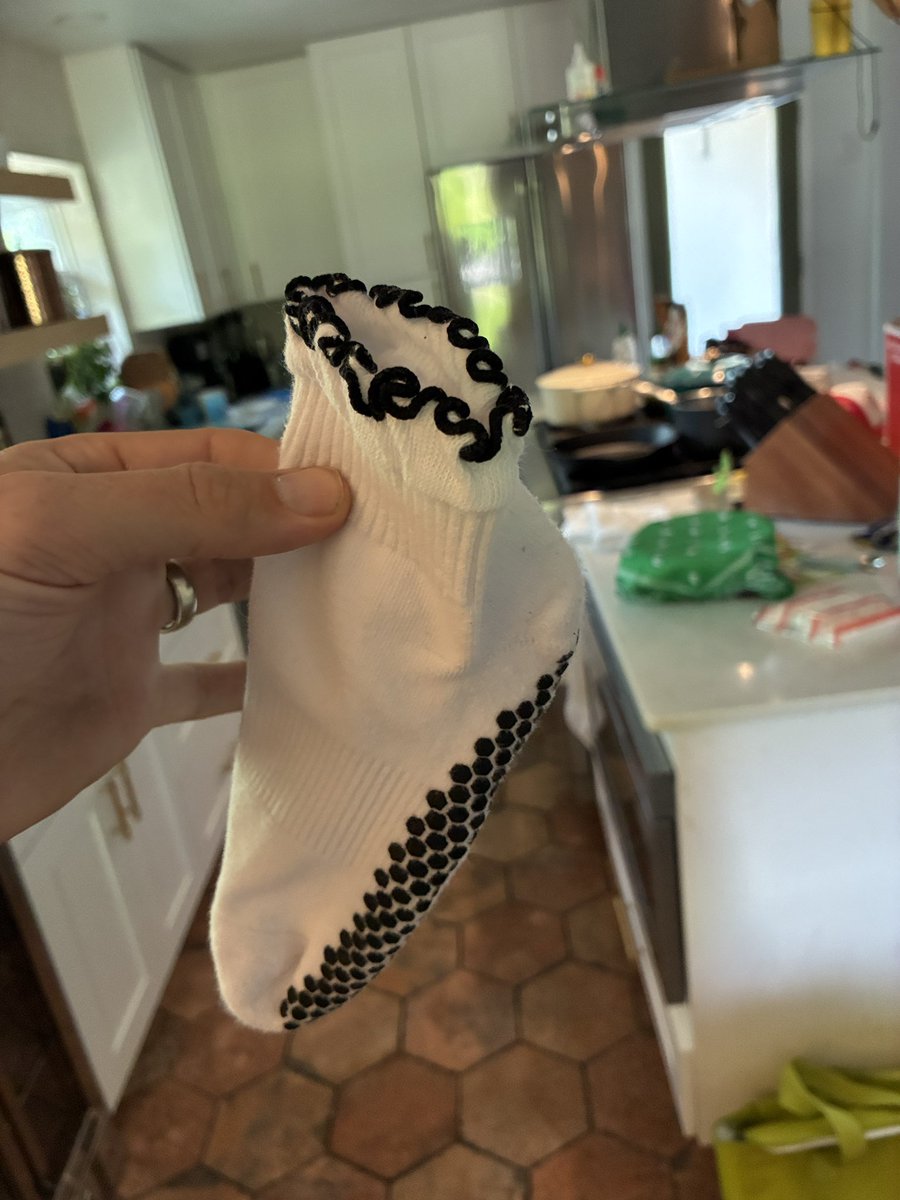 yall look at these goofy ass socks my wife wears hahahahahaha