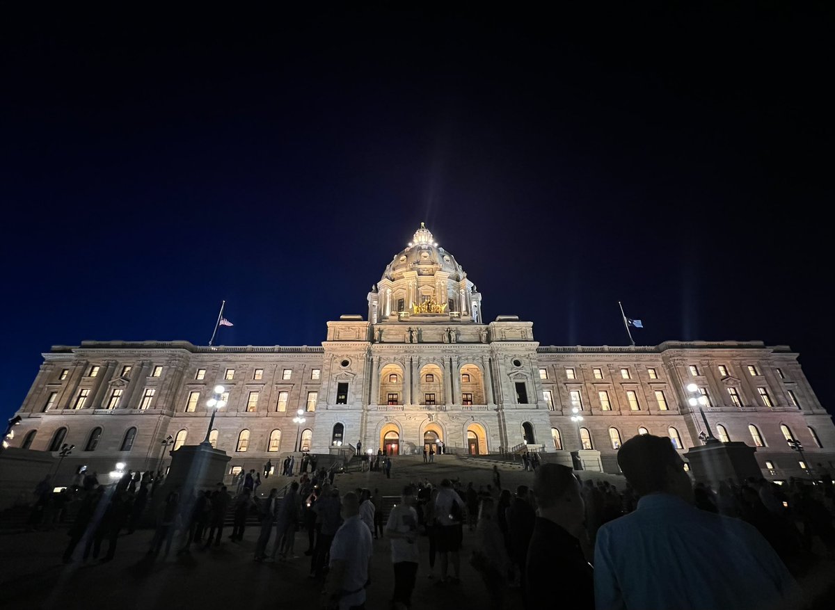 epmurphymn's tweet image. The People’s House lit from within, a beacon burning brightly, at the vigil for Melissa and Mark Hortman.