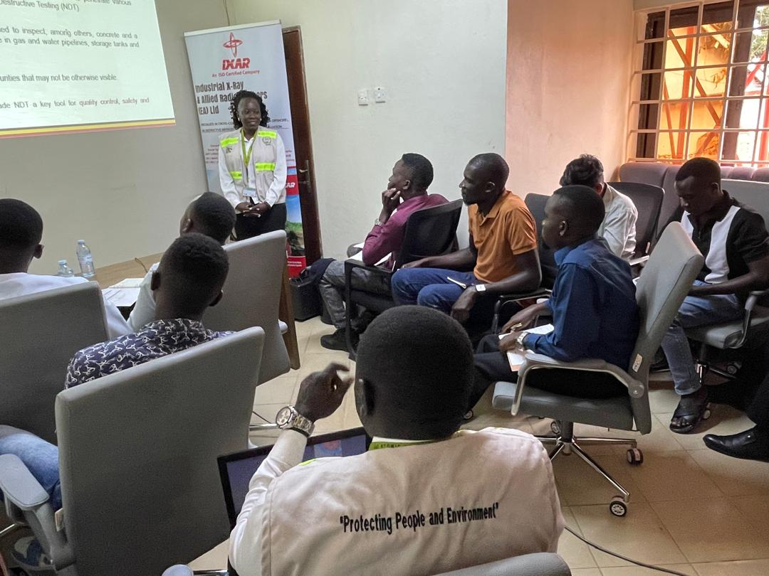 IXARUG1's tweet photo. A lecture session with the team from @AECUganda where Miss Edna Emong, a Radiation inspector takes on the stage to educate the trainers on safety and how best they can protect themselves when handling Radiation equipment at the field.
#ixartrainingNDT https://t.co/Ueli6K2Bfq