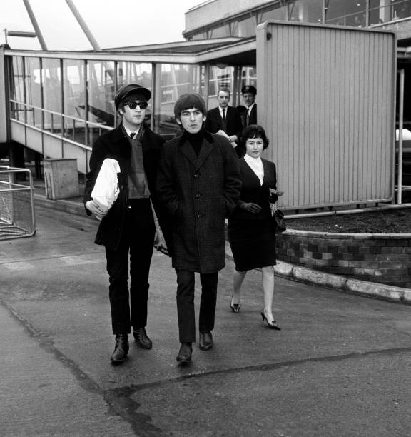 BeatlesArchive2's tweet photo. John Lennon and George Harrison walk towards their plane at London Airport to return to Paris after a 24 hour visit home
The #Beatles https://t.co/Dy4bmis8G9