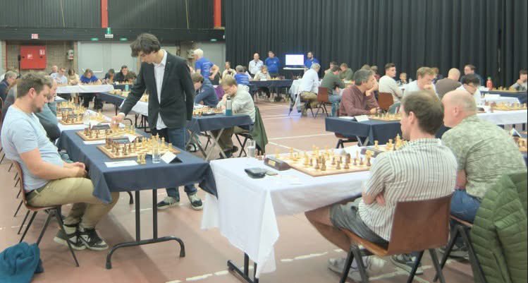 GM Daniel Dardha sets a World record in clock simultaneous play in Belgium🎖

The World record clock simultaneous play attempt was organised by chess club Karpov Deinze Belgium and took place on 9th of June. The best Belgium player GM Daniel Dardha played 50 simultaneous clock