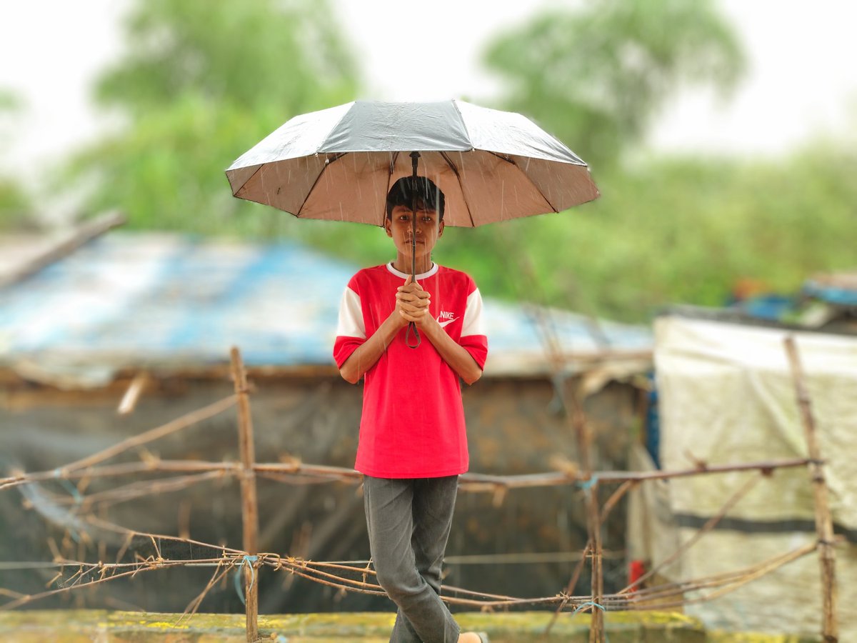 RoAnisHlaMyint's tweet image. "A joyful day in the camp with rainwater."

Or a little longer for clarity:

"It was a happy day at the camp. The rainwater made everyone feel fresh and joyful."

#CampLife #RainyDayJoy #UnexpectedFun #NatureTherapy #CampMemories #PuddleJumping