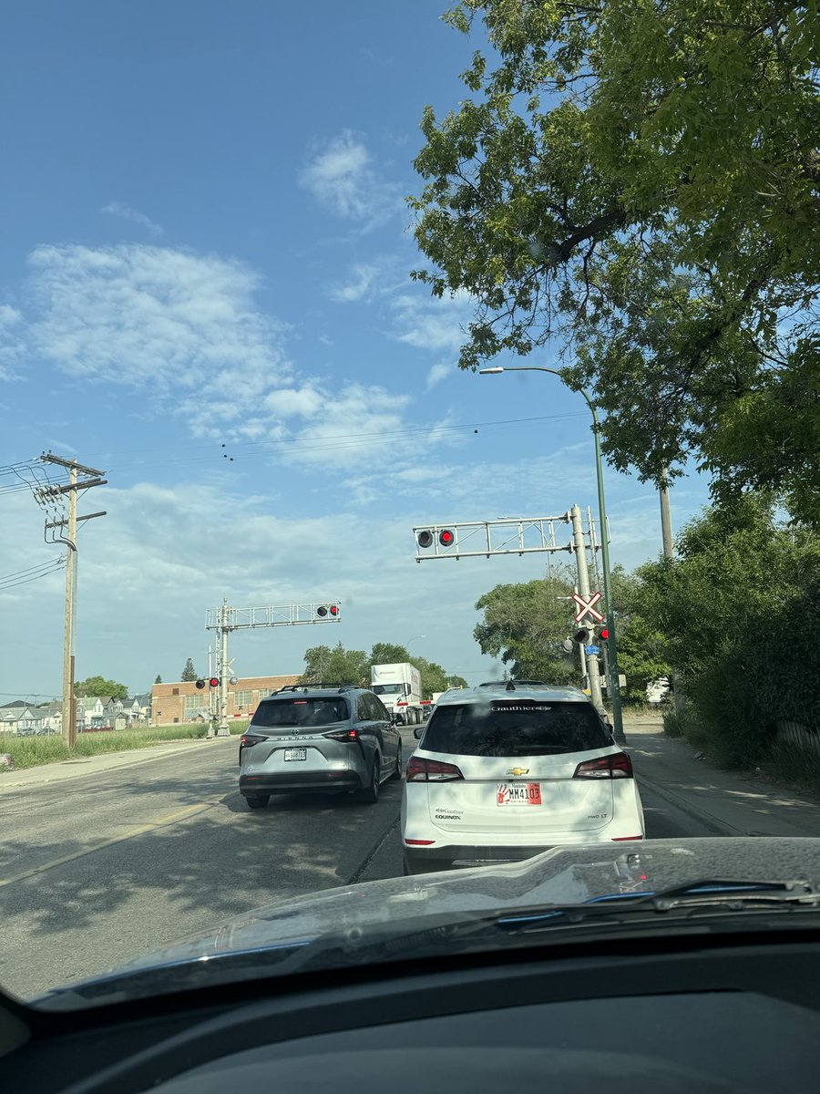 A first for me, stuck at a train with no train.

I swear to Gord, I could get stuck at a train when there are no tracks.