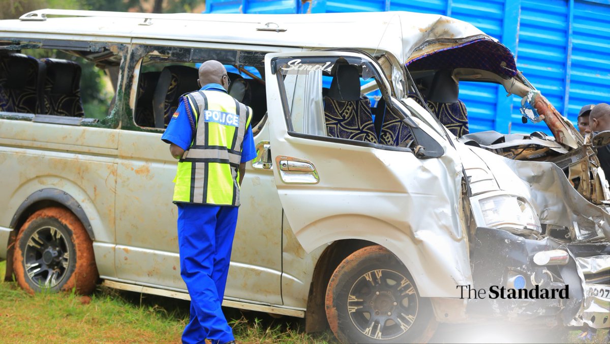 Kisii Central Base Commander Collins Omondi inspects vehicles involved in an accident at Daraja Moja along the Kisii-Keroka highway on Thursday afternoon. The crash claimed two lives and left 19 injured. Kisii Central OCPD Musa Imamai said a Nissan matatu lost control and hit