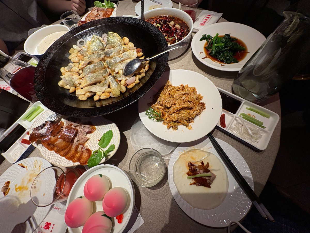 也是吃上北京烤鸭了