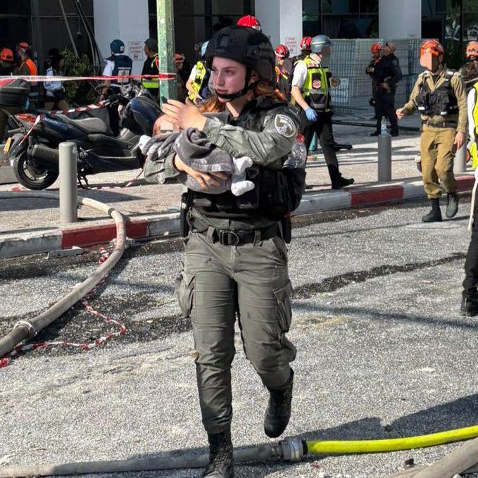 jacksonhinkle's tweet photo. 🤣🇮🇱 Israel is handing random babies to IDF TikTok girls in uniform to take STAGED PHOTOS.

🇮🇳 Indian simps then boost the images on social media! https://t.co/sCd19N4bhL
